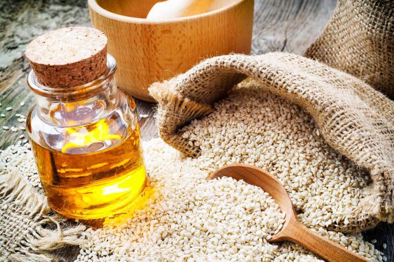 Rice Bran Oil with rice and spoon