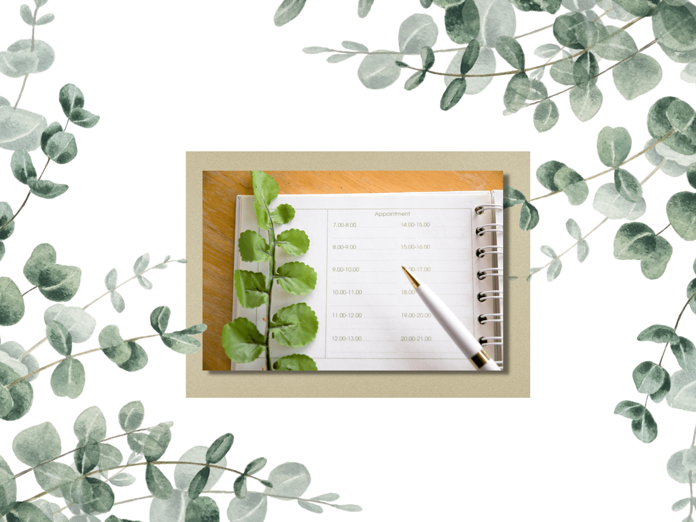 Planner with green leaves and pen